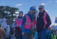 Protesters Alter America the Beautiful Verse