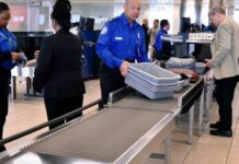 Security screening bottlenecks stretching outside — who’s to answer?